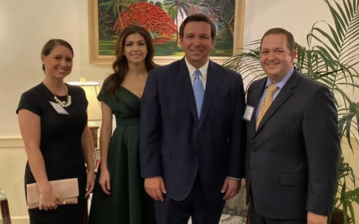 Gov. Ron DeSantis and Evan Power